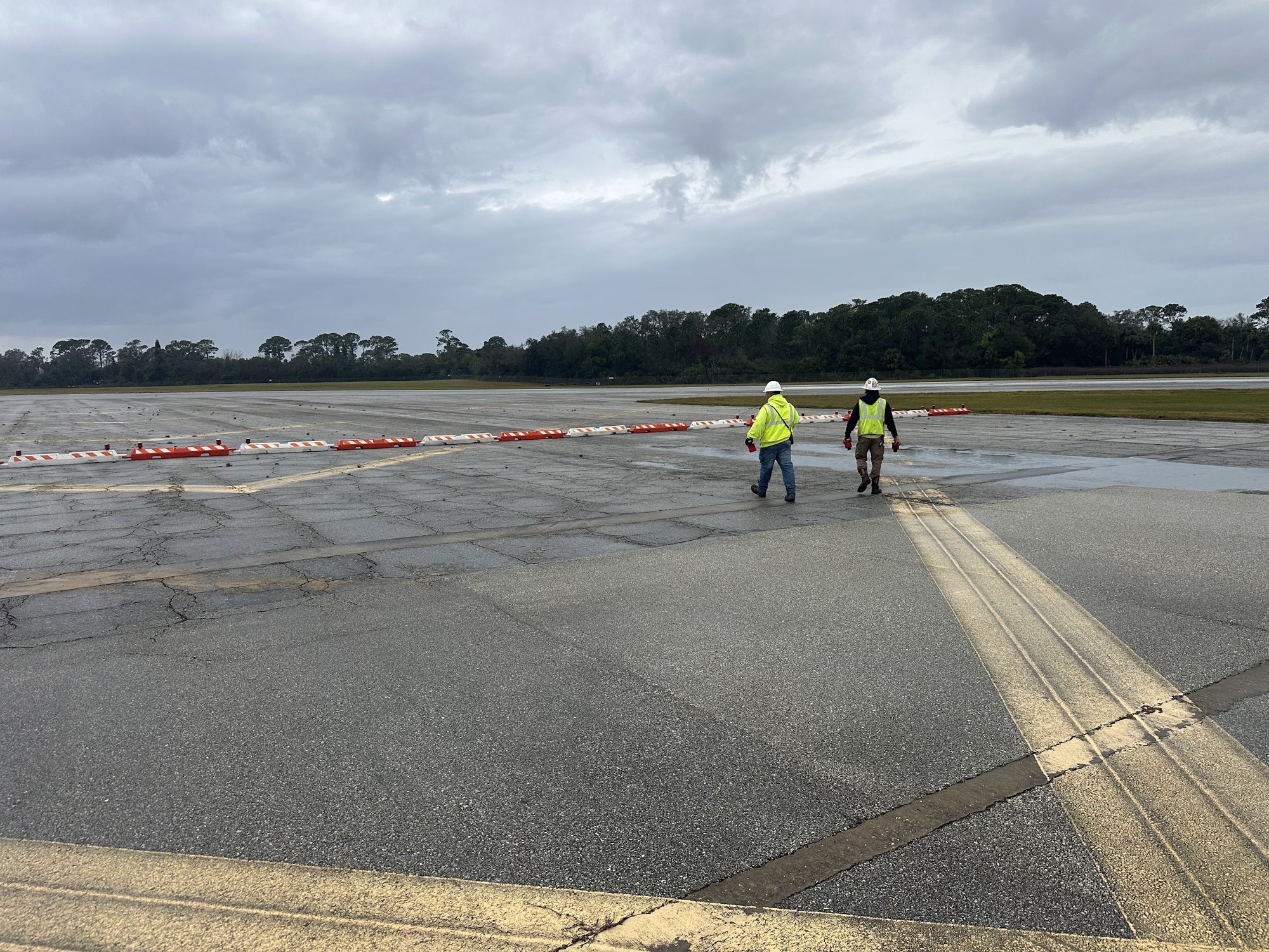 Field team walking an active construction site