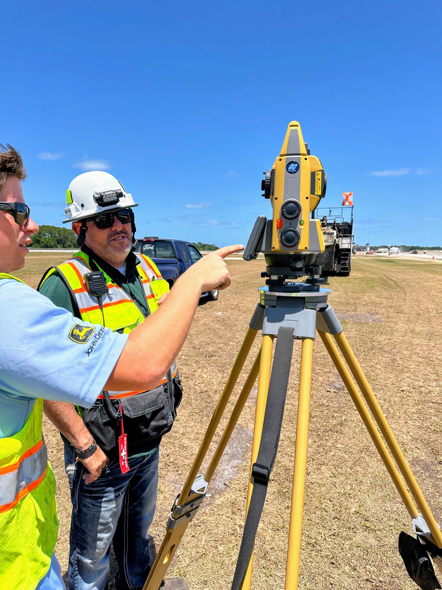 Field crew running a Topcon total station onsite during training